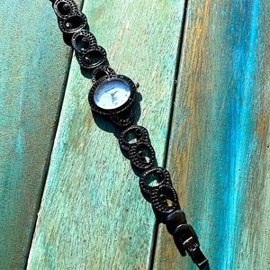 Strada Black Rhinestone Watch. Pearlescent face